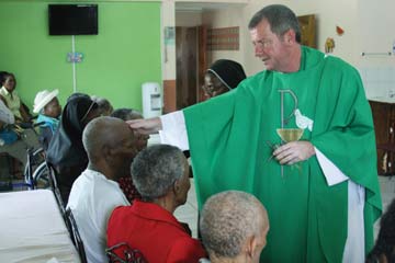 Anointing elderly at St. Lucia